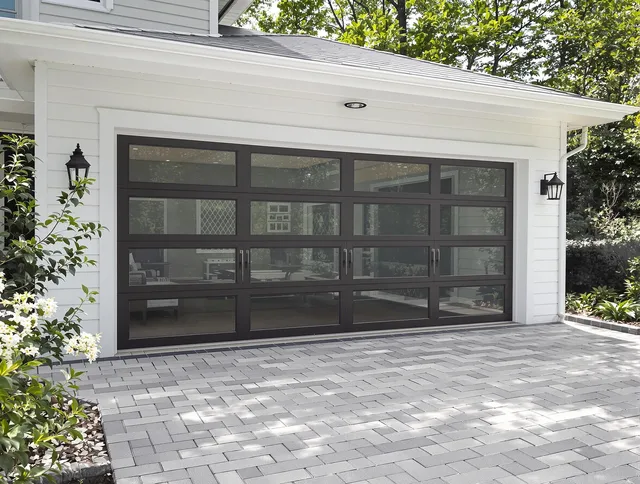 Huntersville Garage Door Repair design specialist presenting custom garage door options to Huntersville homeowner