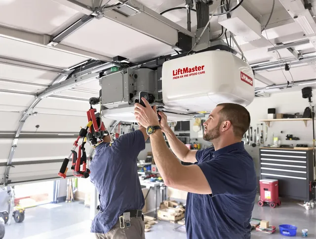 Huntersville Garage Door Repair technician performing advanced diagnostics on garage opener in Huntersville