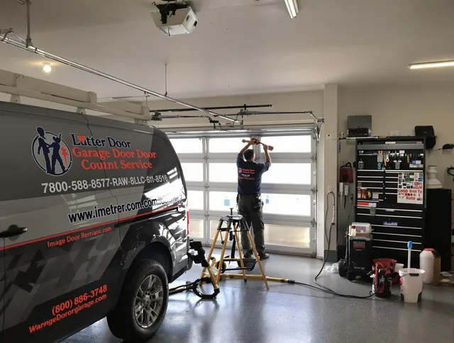 Huntersville Garage Door Repair team performing same-day garage door repair in Huntersville